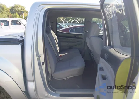 2012 Toyota Tacoma Base V6 z USA, uszkodzony, nr VIN 3TMLU4EN1CM087115